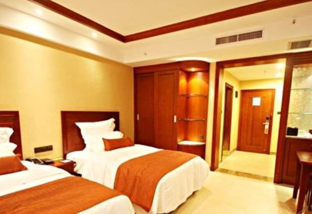 Ramada Plaza Xishuangbanna Hotel Exterior foto